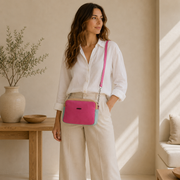 Sacoche en cuir rose fuchsia